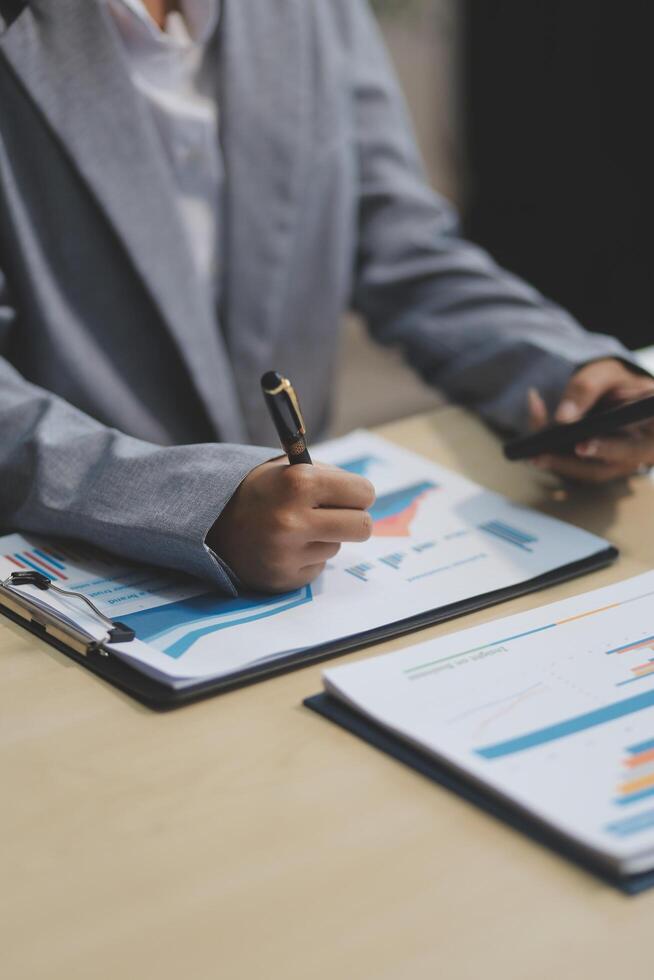 Business Documents, Auditor businesswoman checking searching document legal prepare paperwork or report for analysis TAX time,accountant Documents data contract partner deal in workplace office photo