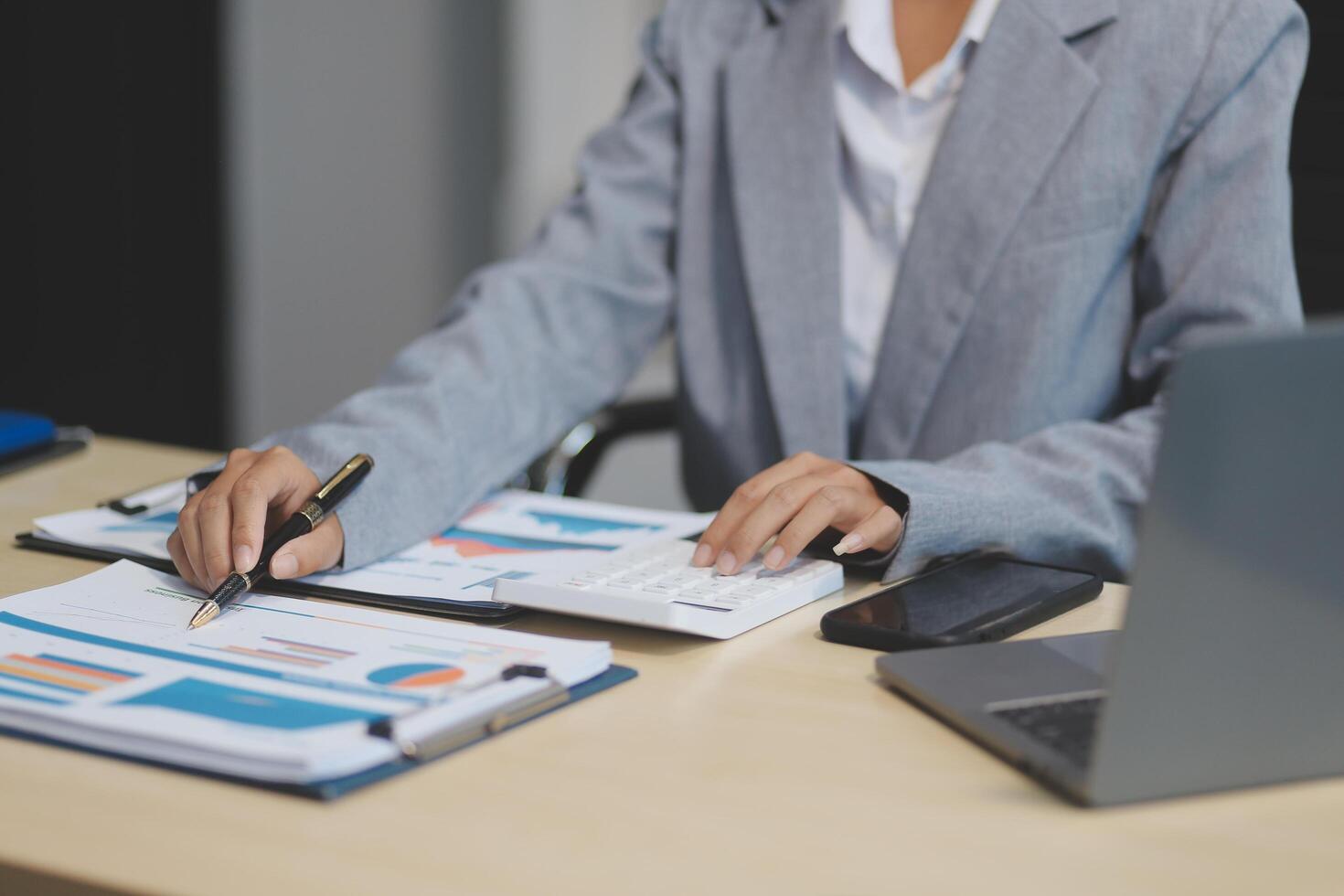 Business Documents, Auditor businesswoman checking searching document legal prepare paperwork or report for analysis TAX time,accountant Documents data contract partner deal in workplace office photo