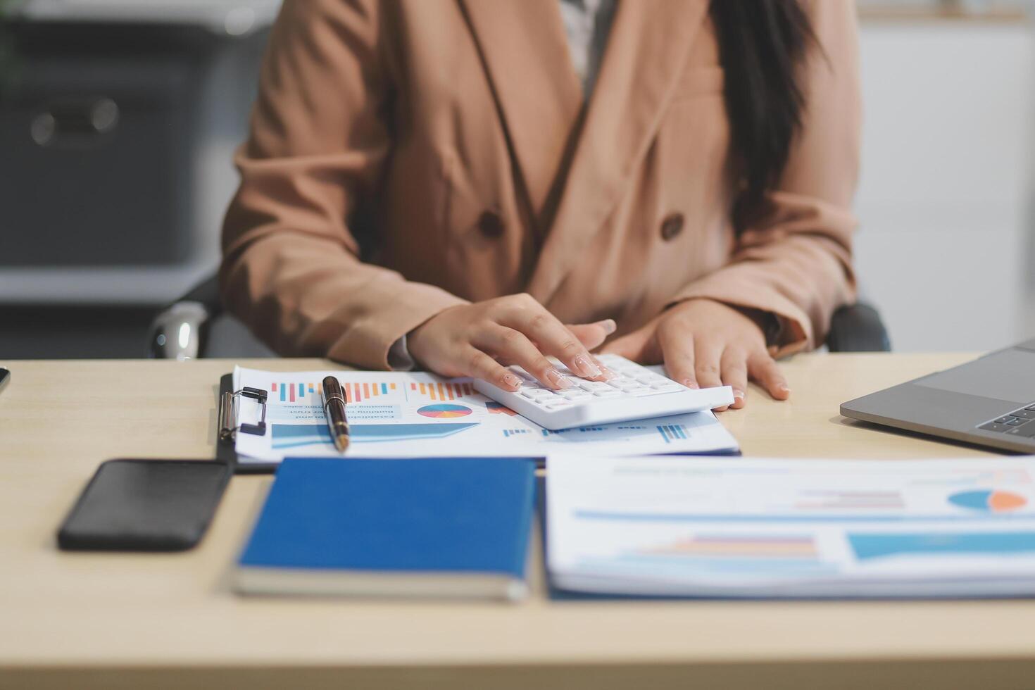 business documents businessman check legal document review Prepare documents or analysis reports, tax items, accounting documents, data contracts, office partner agreements. photo