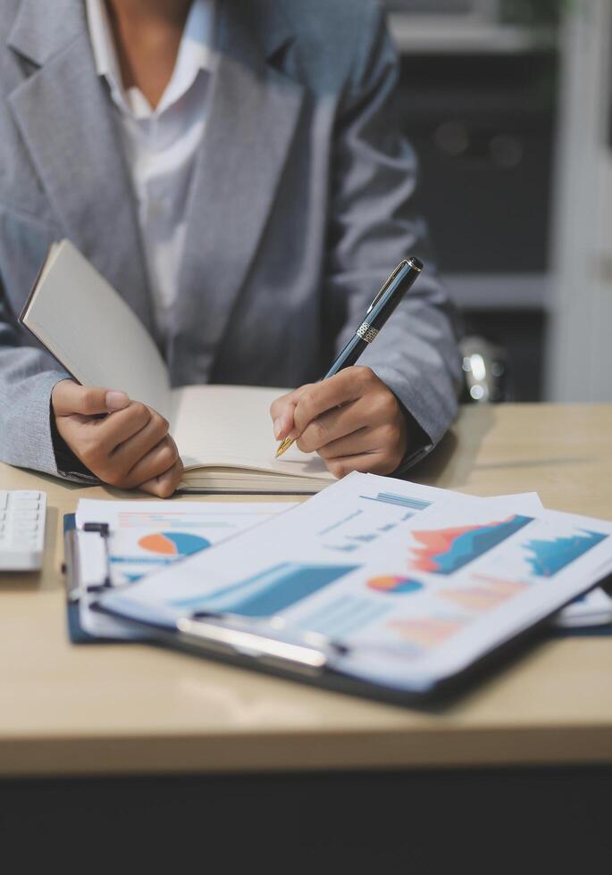 Business Documents, Auditor businesswoman checking searching document legal prepare paperwork or report for analysis TAX time,accountant Documents data contract partner deal in workplace office photo