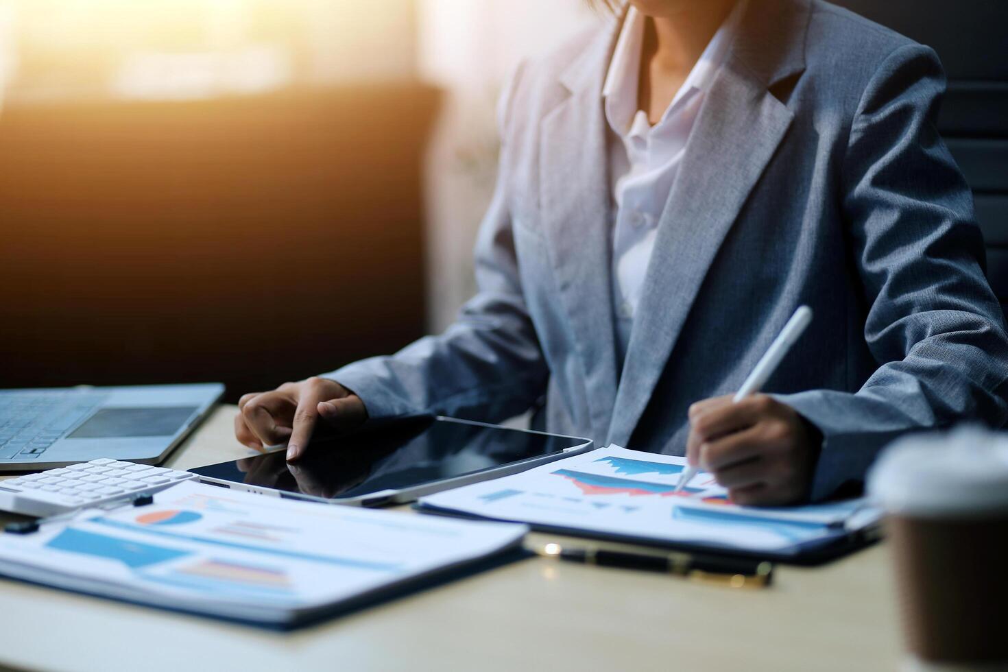 Business Documents, Auditor businesswoman checking searching document legal prepare paperwork or report for analysis TAX time,accountant Documents data contract partner deal in workplace office photo
