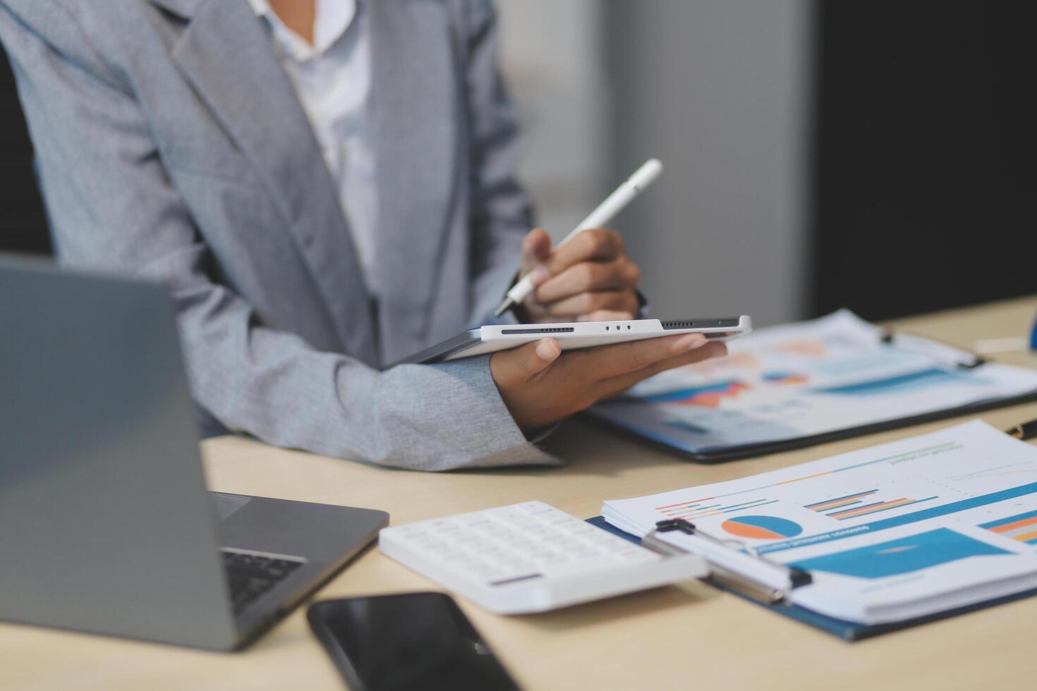 Business Documents, Auditor businesswoman checking searching document legal prepare paperwork or report for analysis TAX time,accountant Documents data contract partner deal in workplace office photo