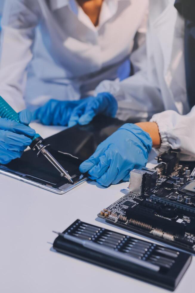 Electronics technician, electronic engineering electronic repair, electronics measuring and testing, repair and maintenance concepts. photo