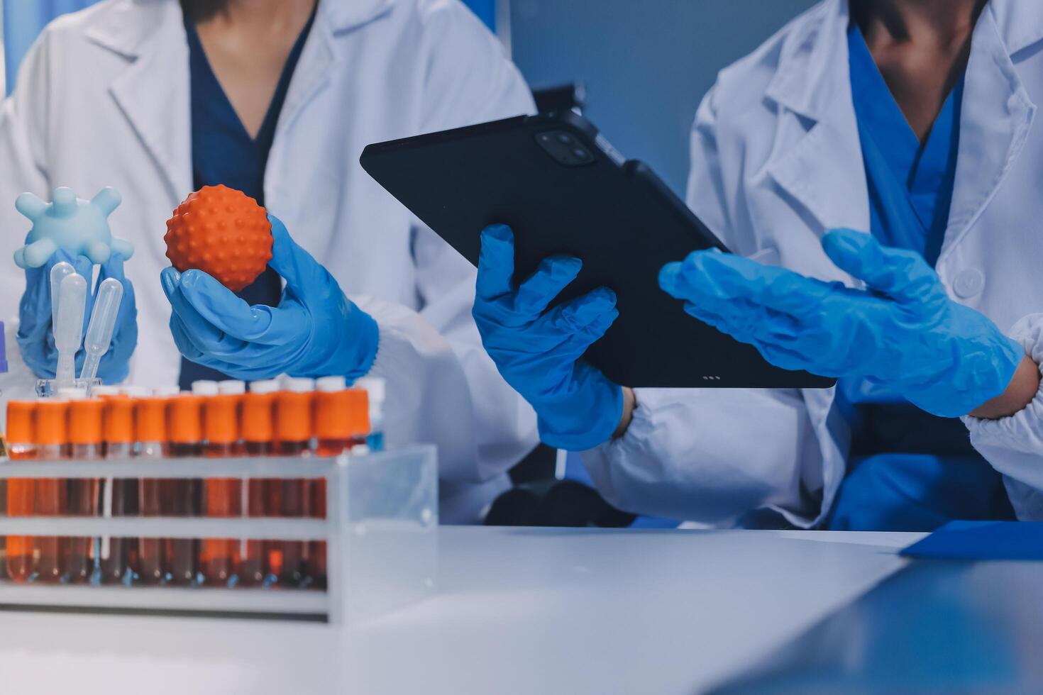 Scientist using microscope in laboratory. Close-up of a researcher's hands adjusting a modern microscope in a lab setting. Science concept photo