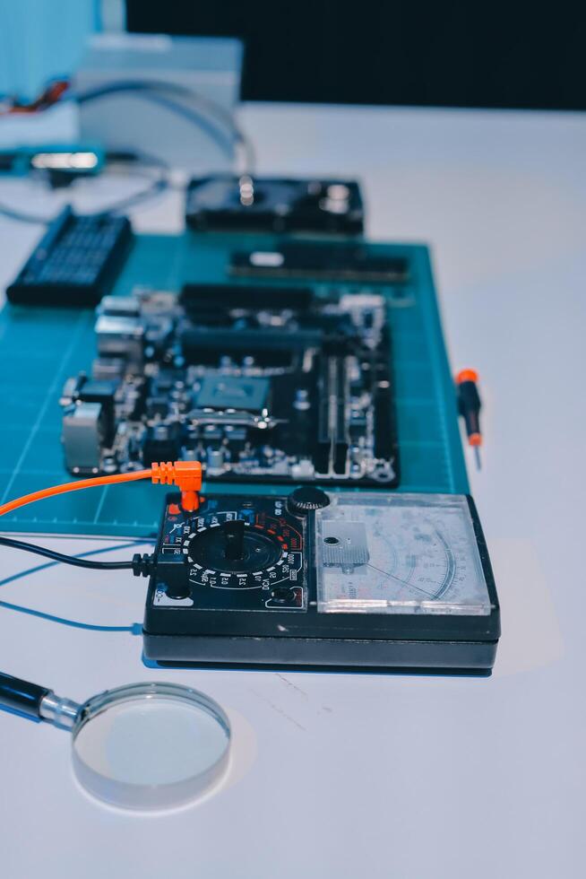 Electronics technician, electronic engineering electronic repair, electronics measuring and testing, repair and maintenance concepts. photo