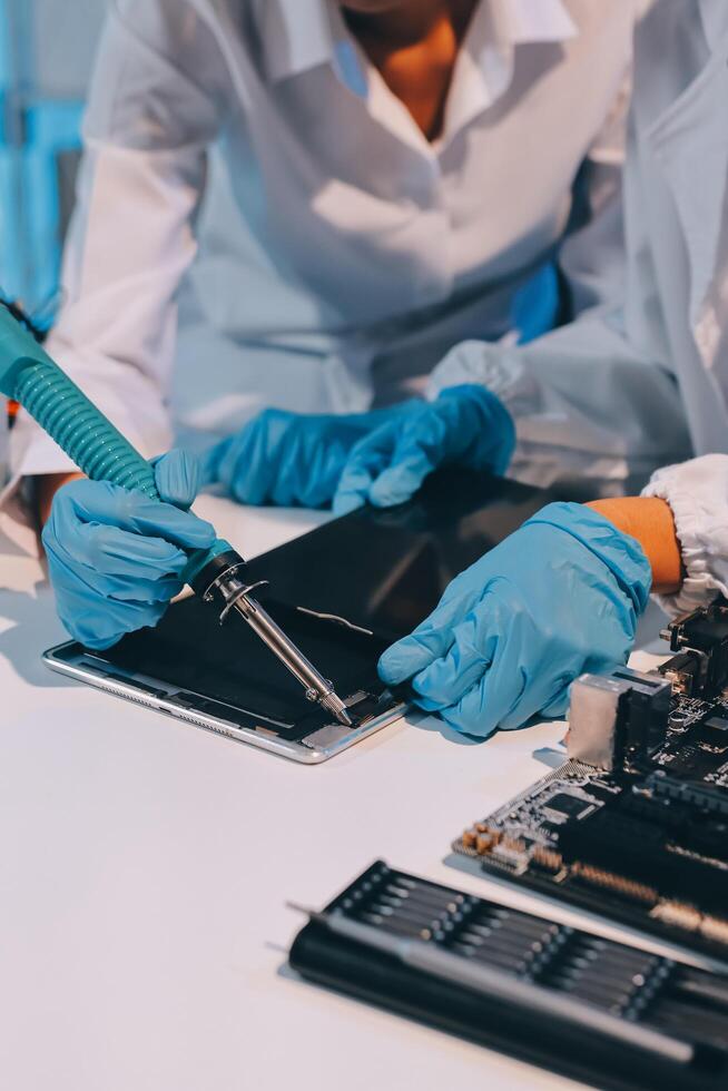 Electronics technician, electronic engineering electronic repair, electronics measuring and testing, repair and maintenance concepts. photo