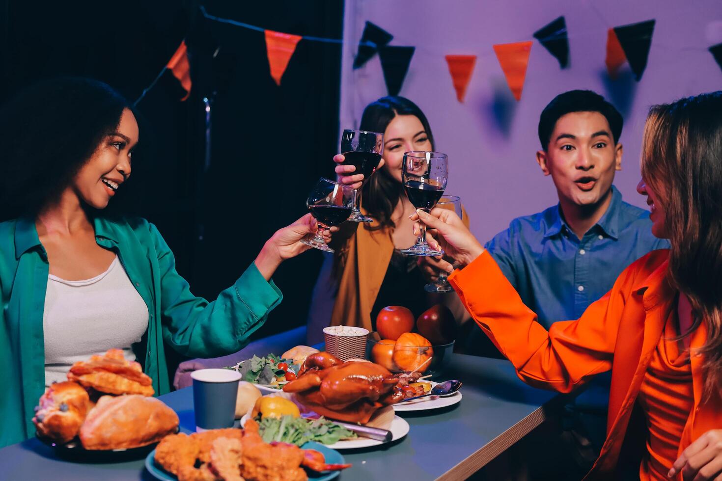 Joyful office Halloween party with coworkers in costumes, celebrating with drinks and laughter, fostering teamwork and festive spirit photo