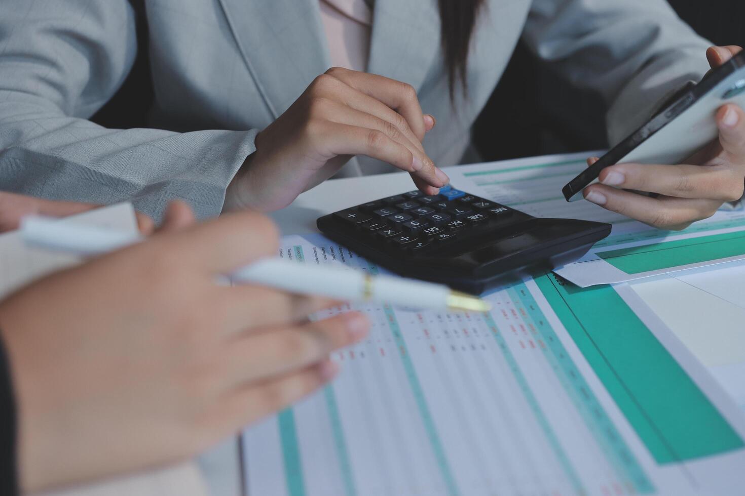 Team of business people are meeting to analyze data for marketing plan,Market research reports and income statistics, Financial and Accounting concept. photo