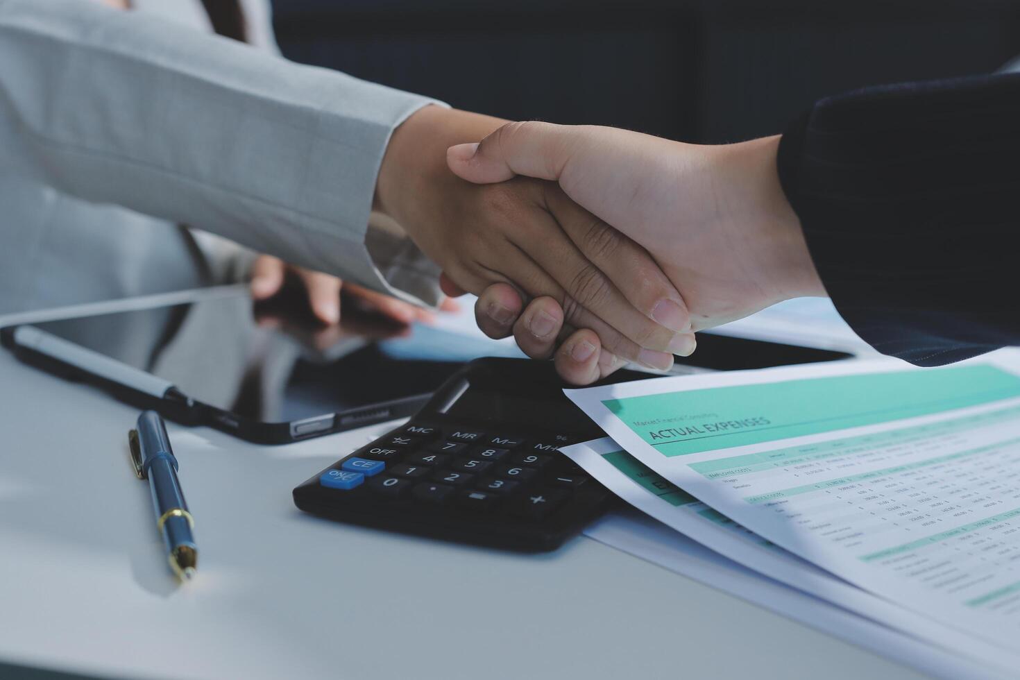 Business handshake for teamwork of business merger and acquisition,successful negotiate,hand shake,two businessman shake hand with partner to celebration partnership and business deal concept photo