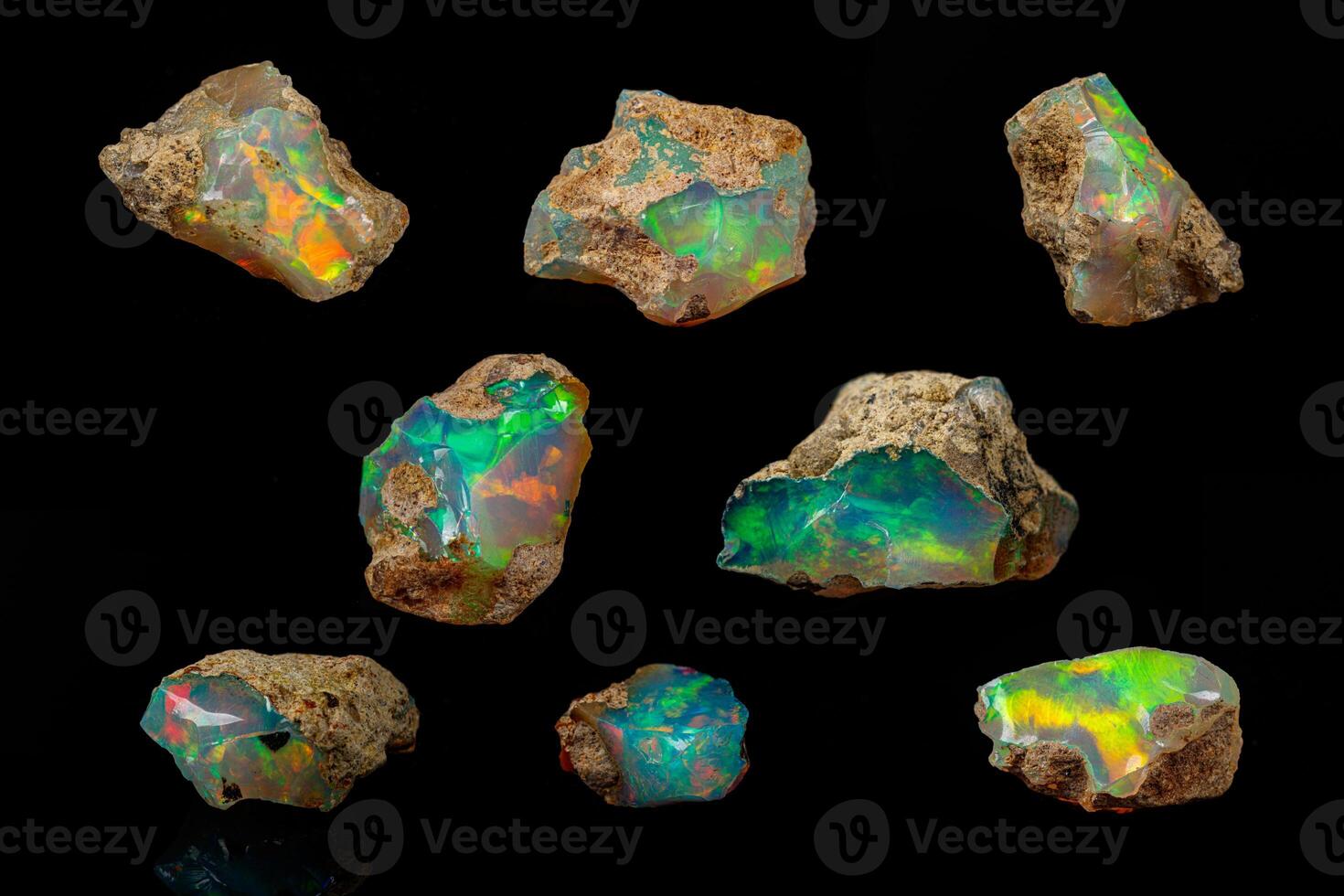 macro mineral stone rare and beautiful opals on a black background photo