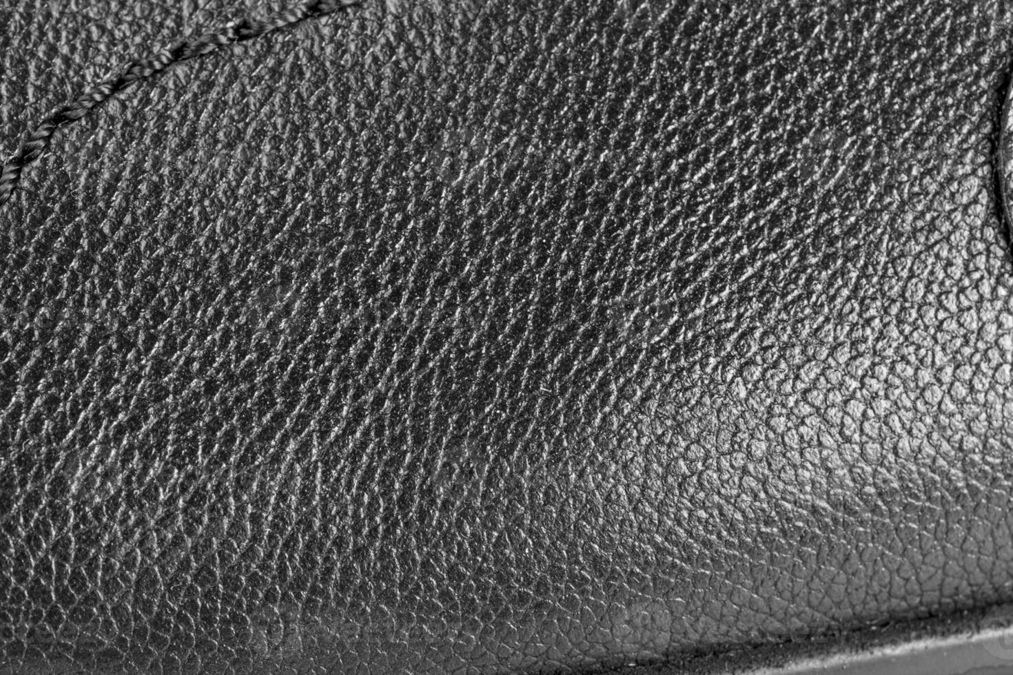 black leather texture with stitching photo