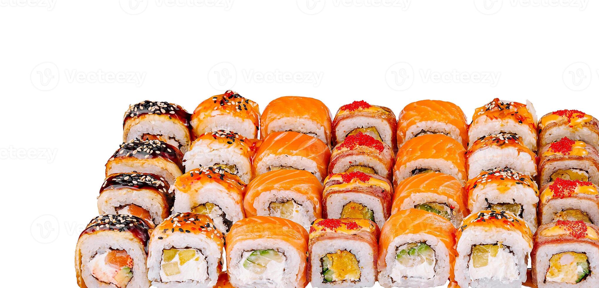 Large set of various sushi and rolls is lying on a white background photo