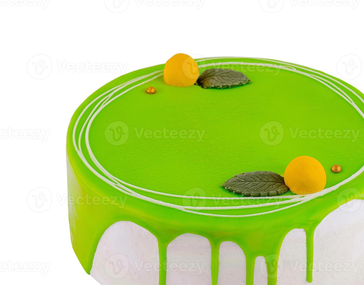 Delicious green cake decorated with lemon and mint leaves on white background photo