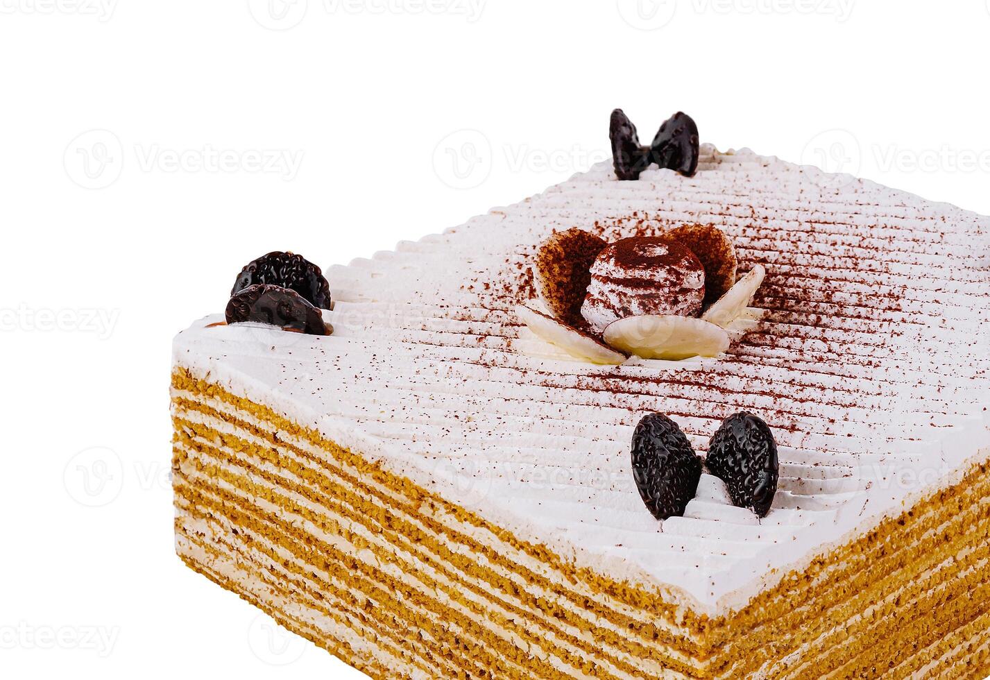 Delicious square honey cake standing on white background photo