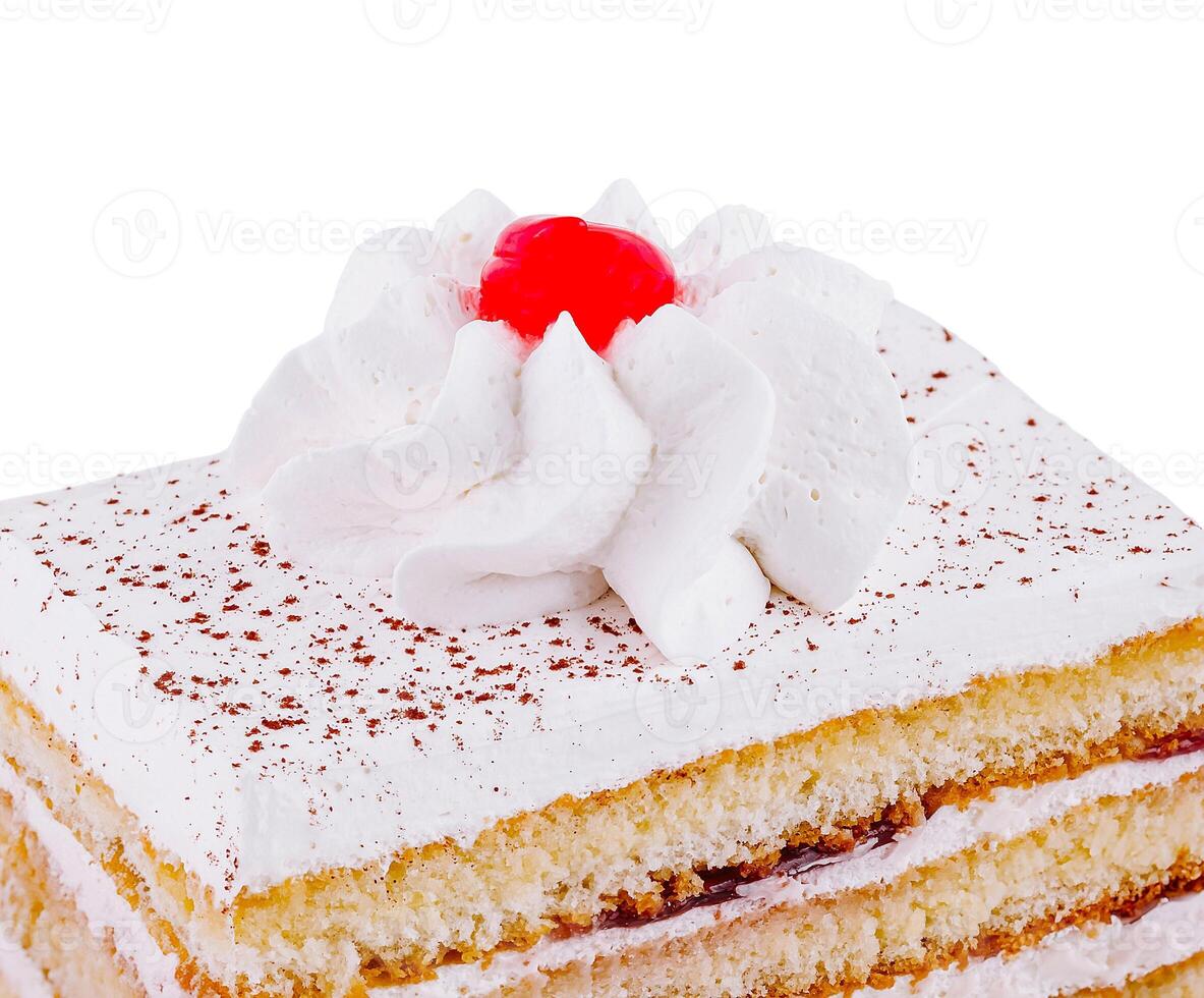 Delicious slice of layered cake with whipped cream and cherry topping on white background photo