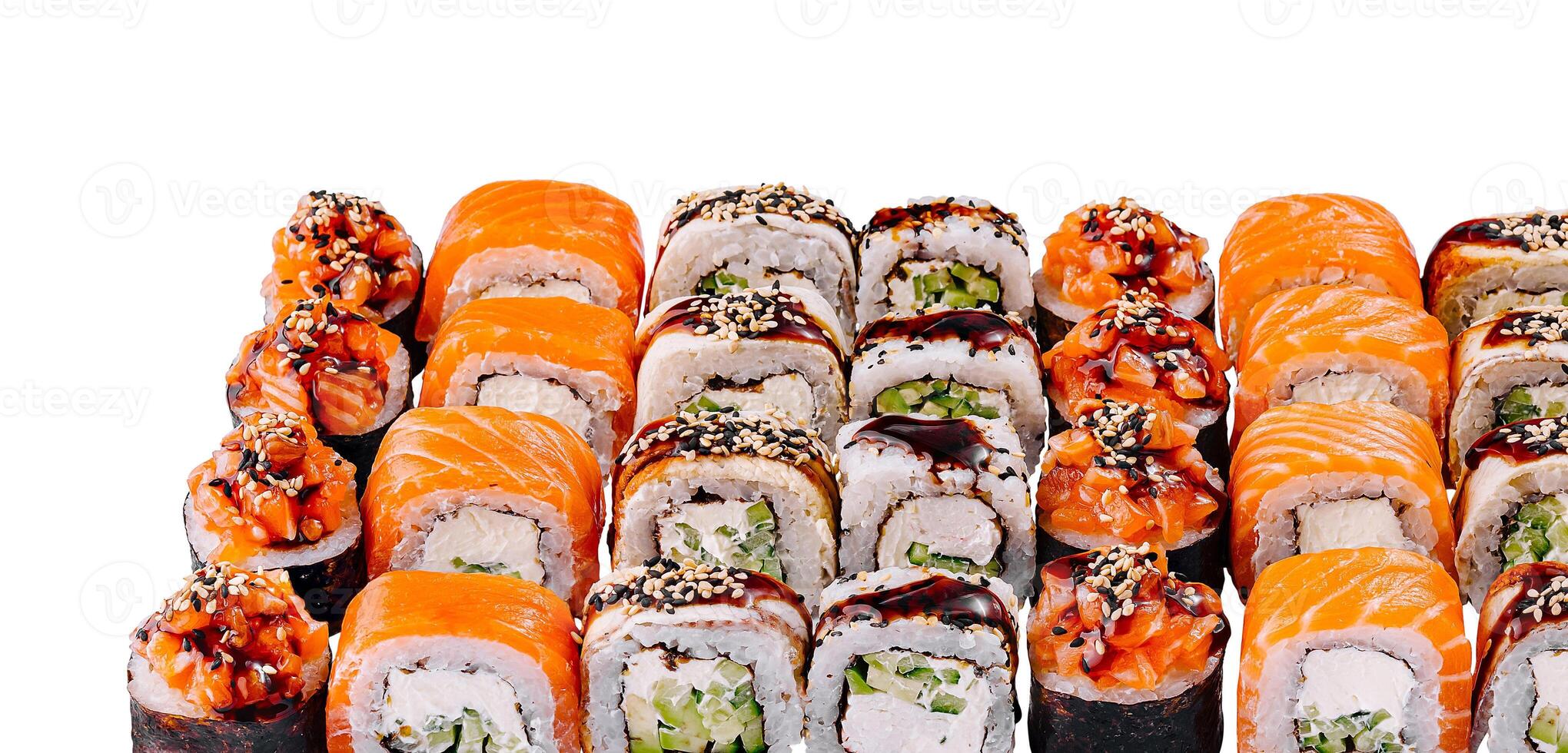 Sushi set with salmon, cucumber and cream cheese being presented on white background photo