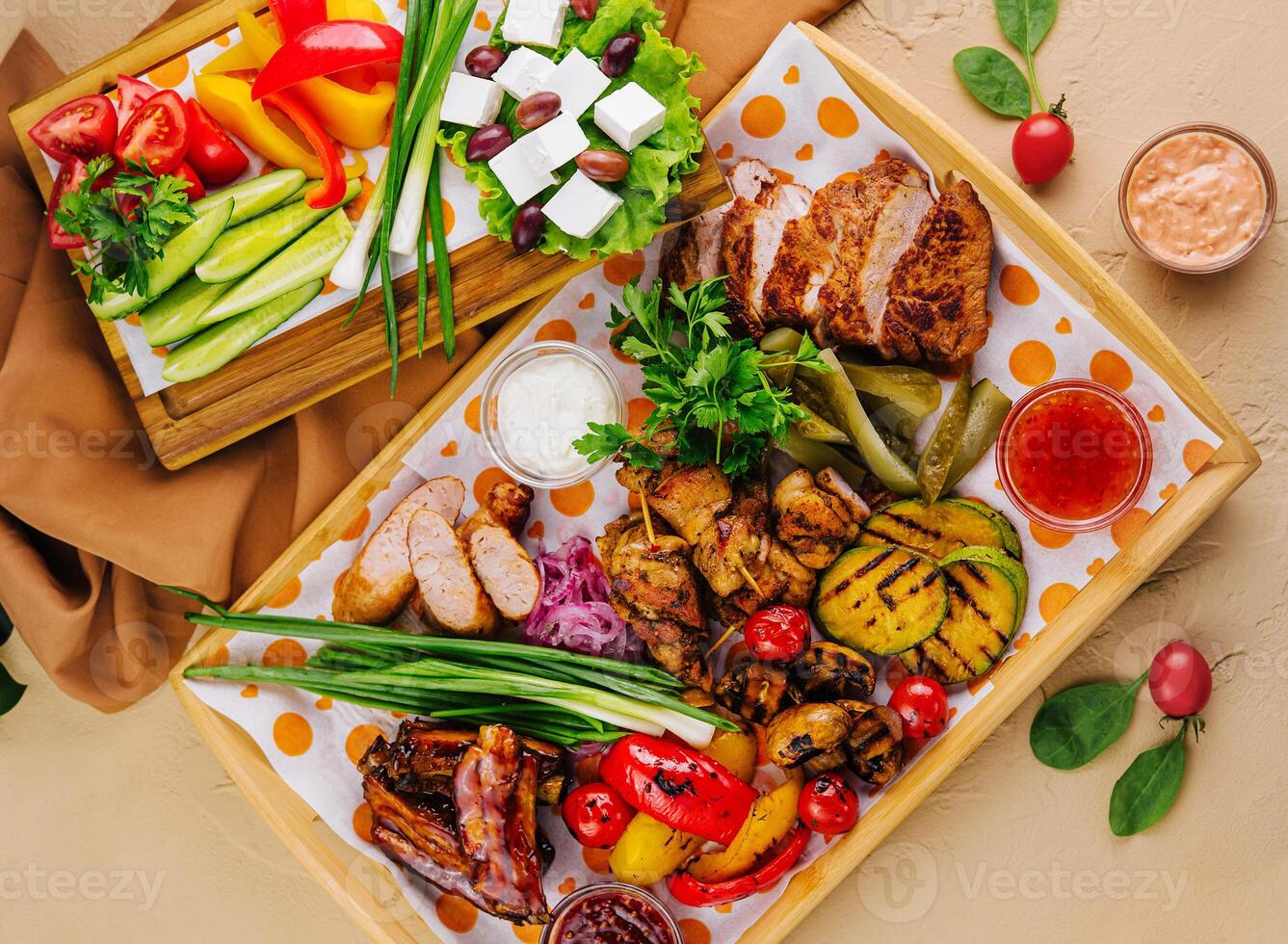 Assorted grilled meats and fresh vegetables platter photo