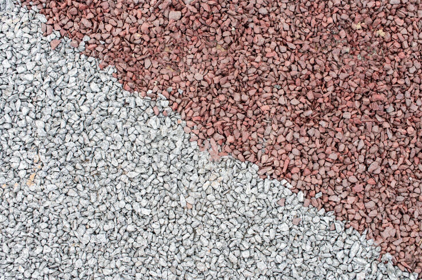 Contrast of pink and gray gravel. photo