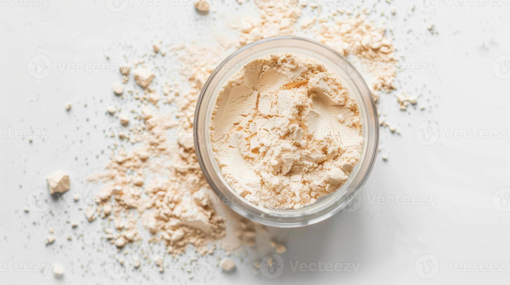 Jar of beige protein powder with scattered powder on a white background. photo