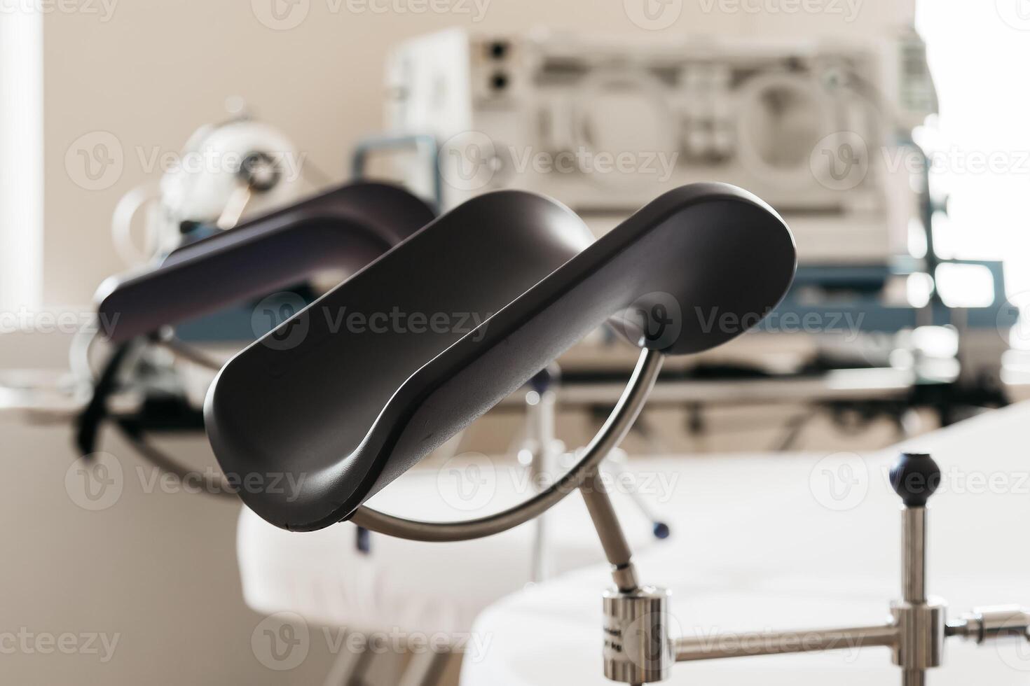 Modern delivery room prepared for natural childbirth. Features a clean, sterile environment and advanced medical equipment, highlighting a comfortable and supportive setting for maternity care. photo