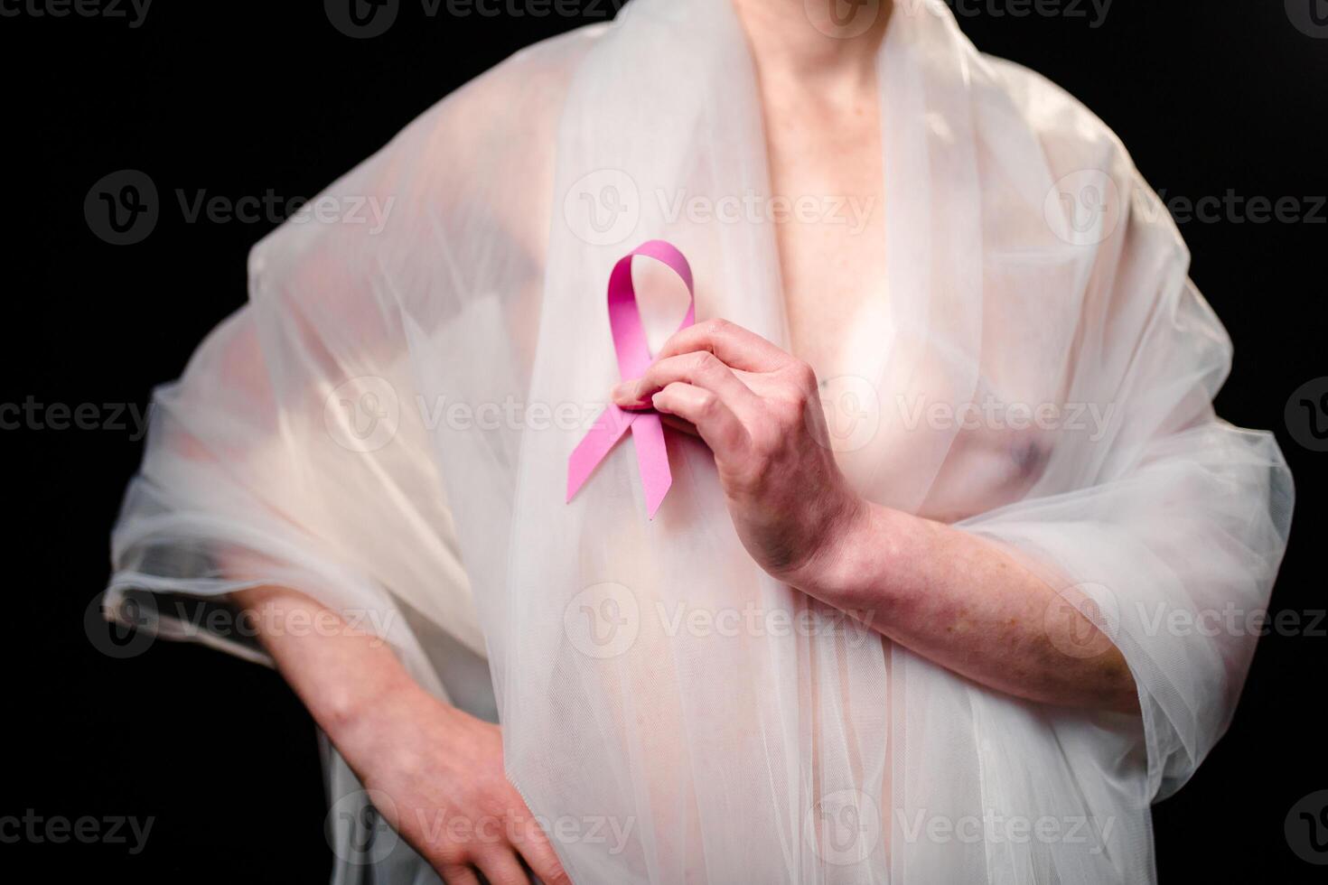 Woman Holding Up The Symbol Of Hope photo
