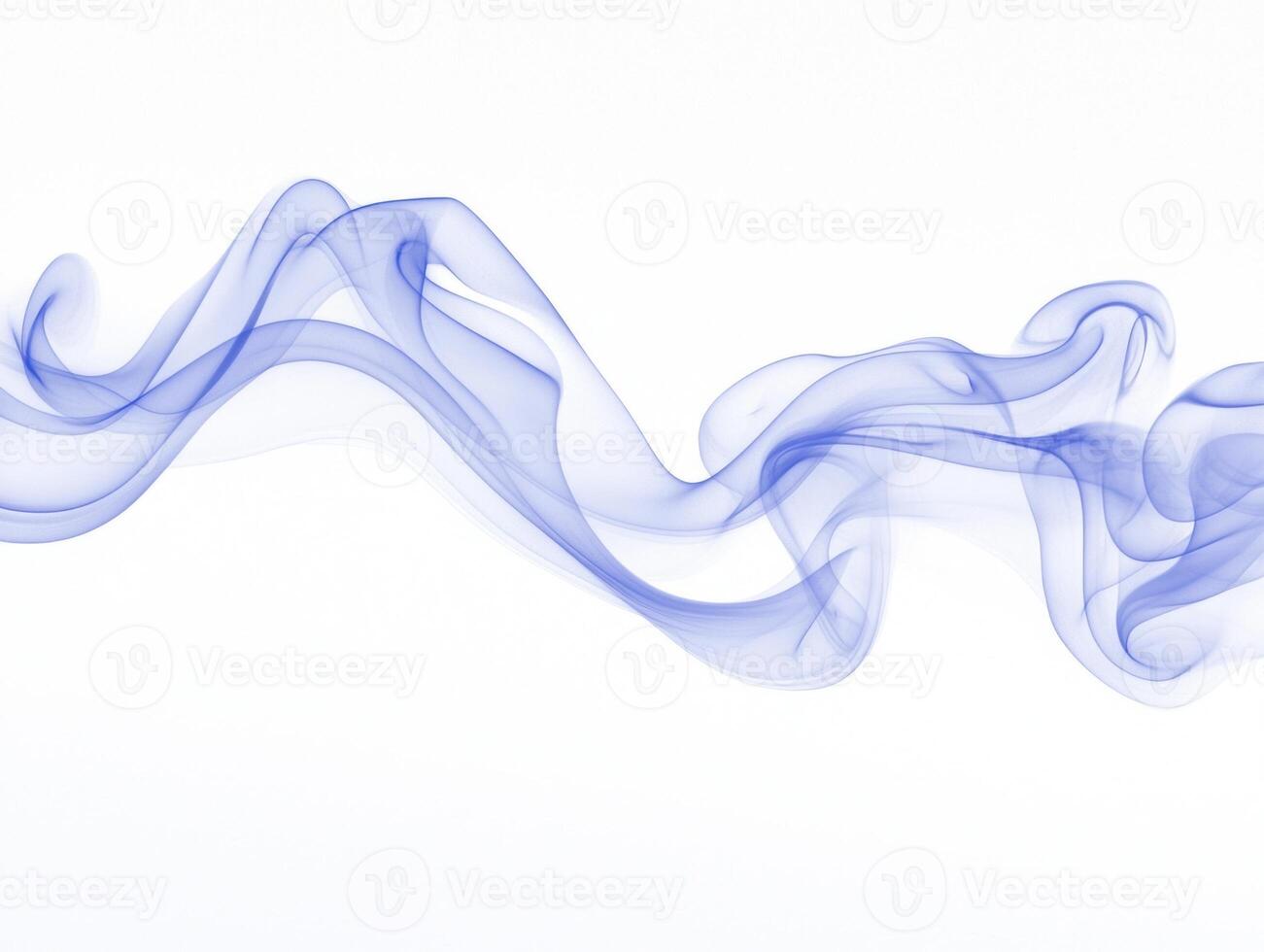 Delicate swirls of blue smoke rise and twist, creating a serene visual dance against a bright white backdrop, with varying transparency and depth to each curl. photo