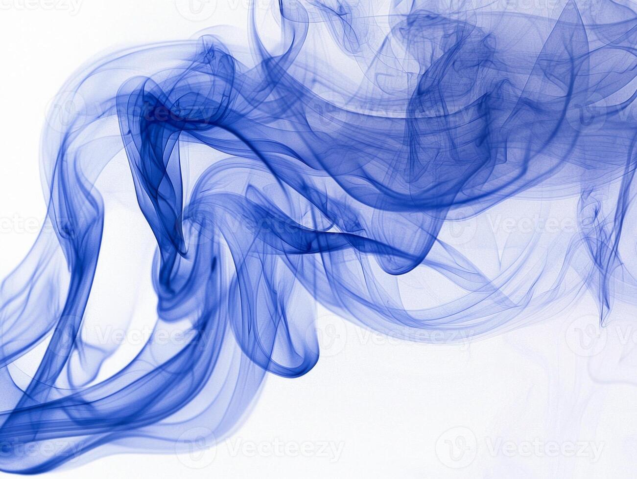 Delicate tendrils of blue smoke rise and twist effortlessly, showcasing a stunning interplay of light and shadow against a bright white canvas, evoking a sense of movement and calm. photo