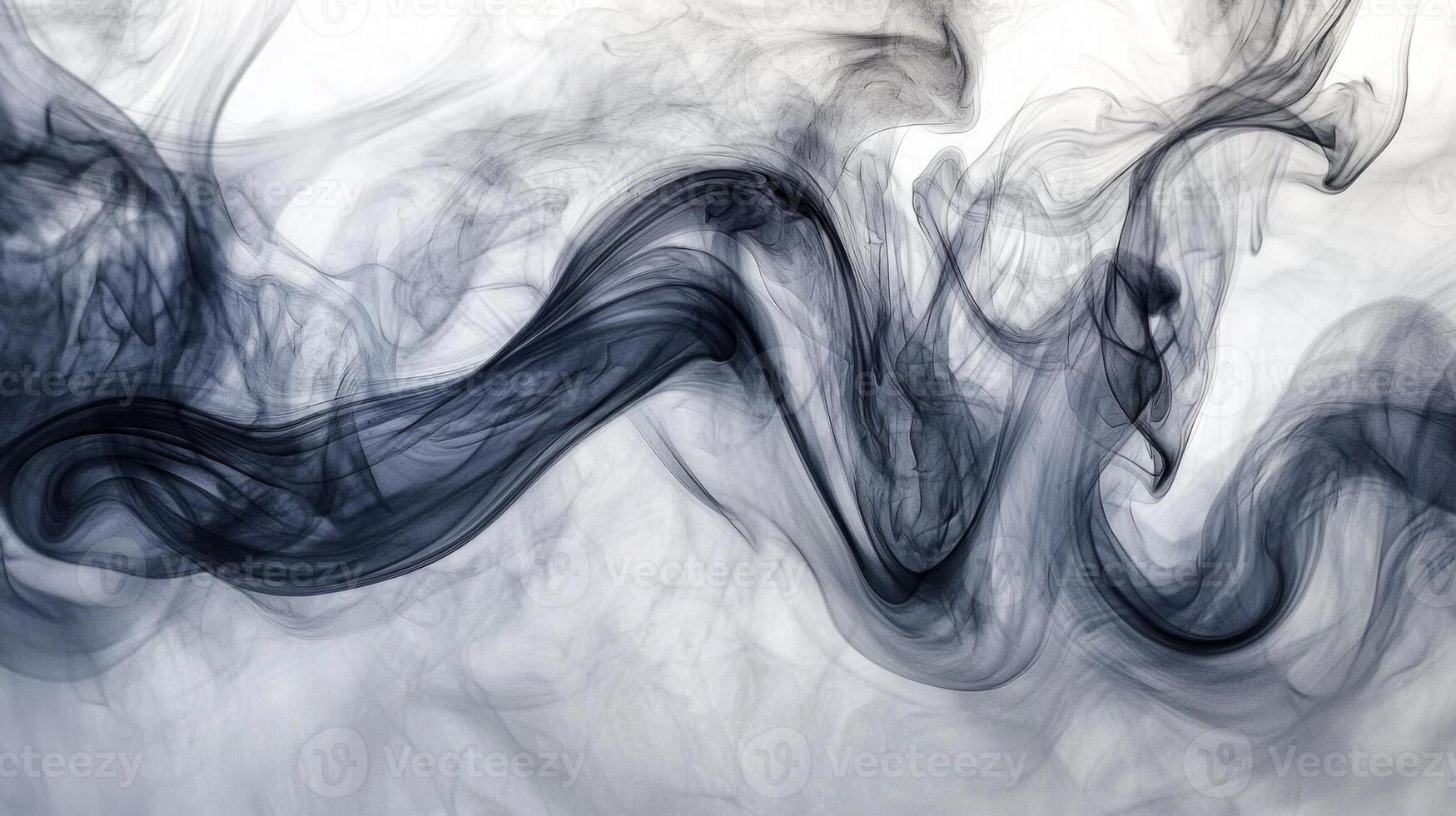 Curling tendrils of gray smoke elegantly twist and rise into the air, blending rich hues of gray seamlessly with the white backdrop. The intricate details evoke a sense of calm and mystery. photo