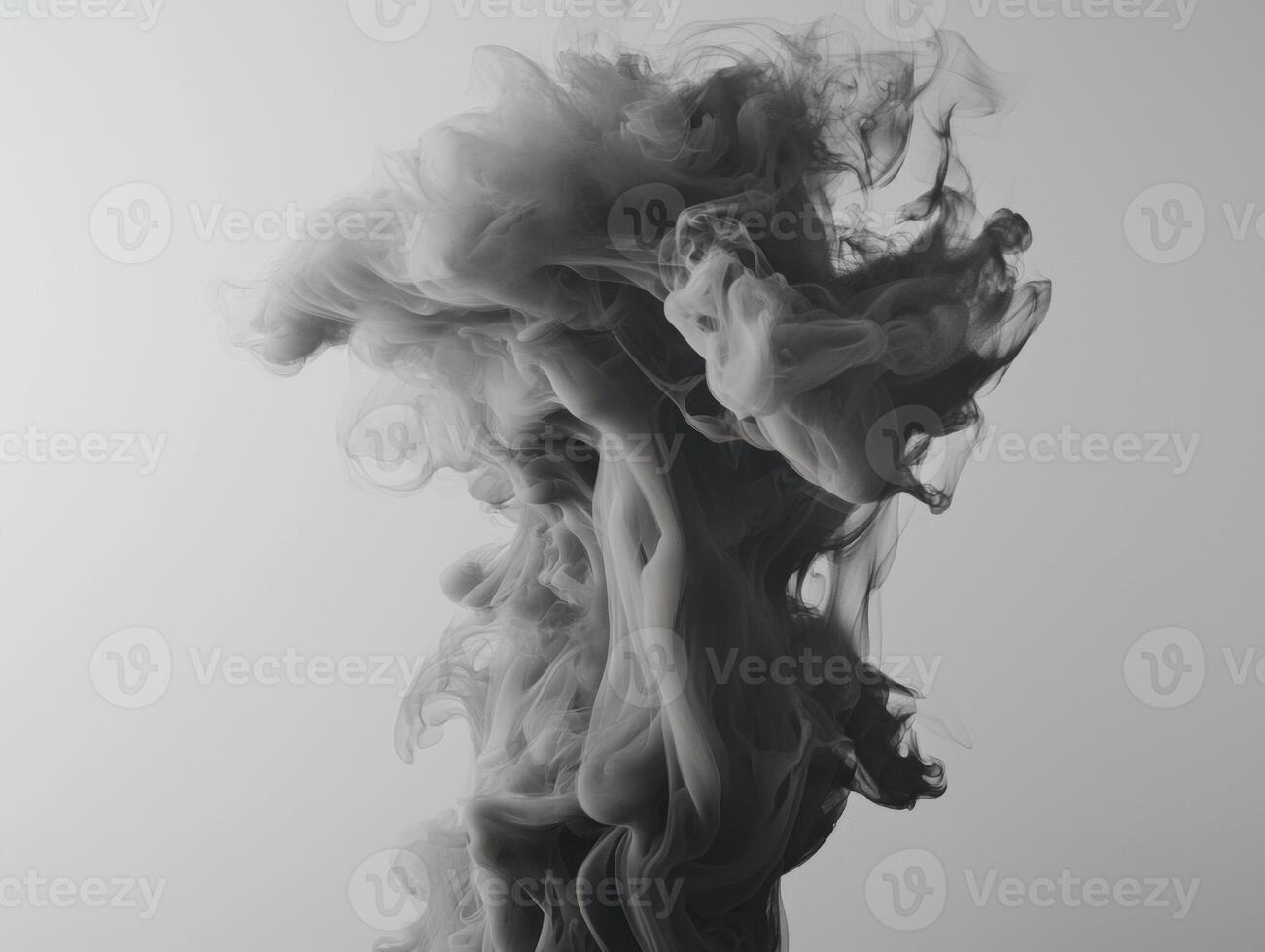 captivating display of gray smoke gracefully ascends, forming intricate, swirling patterns that fade into lighter shades, creating a tranquil yet dynamic visual experience. photo