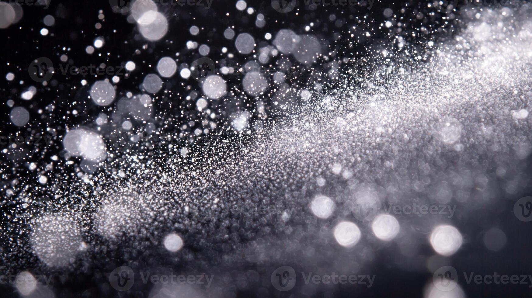 Silver dots create a mesmerizing galaxy-like formation, glowing softly in the darkness. Each particle crafts an ethereal constellation, blending minimalism with cosmic wonder. photo