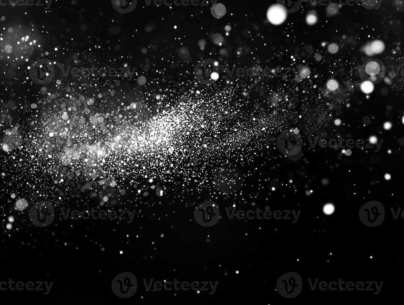 Scattered silver dots shimmer brightly against a dark background, creating a cosmic effect that simulates the enchantment of stardust in a digital universe. photo