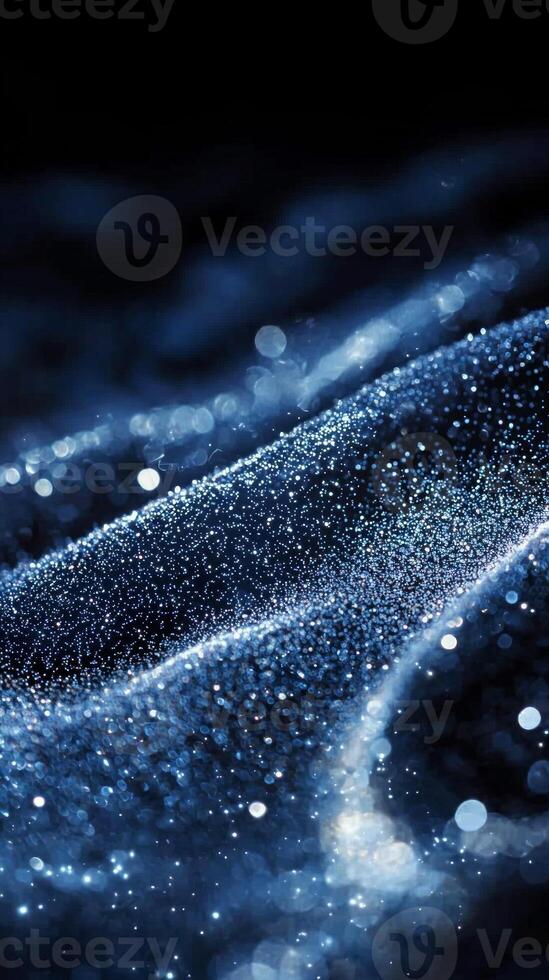 An enchanting display of silver particles swirls in a captivating vortex, exuding a cosmic energy. The shimmer intensifies toward the center, evoking a sense of dynamic movement. photo