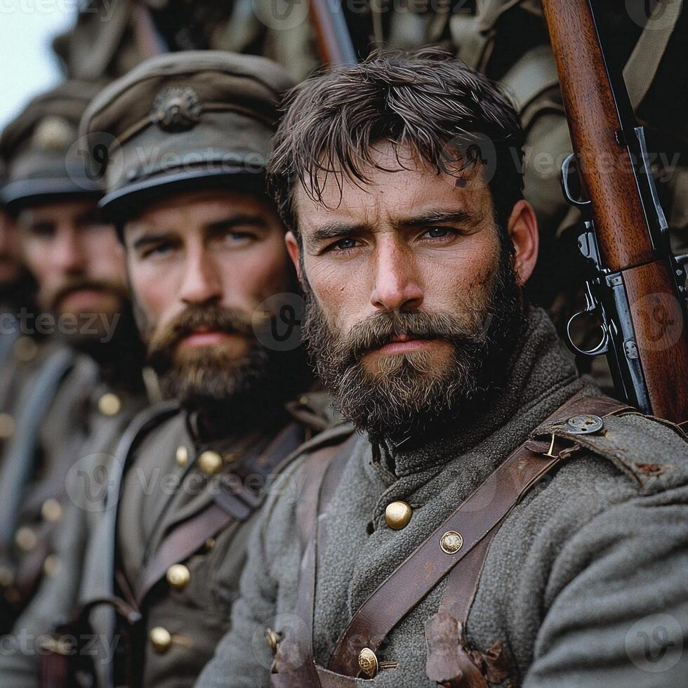 Soldiers of World War I stand sternly clad in militaristic uniforms posing with their rifles as they prepare for a newspaper feature showcasing their camaraderie and valor. photo