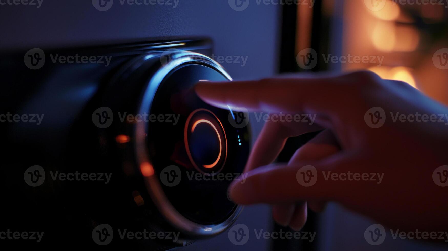 user engages with a smart thermostat adjusting the temperature through voice control in a stylish contemporary living space illuminated in warm light. photo