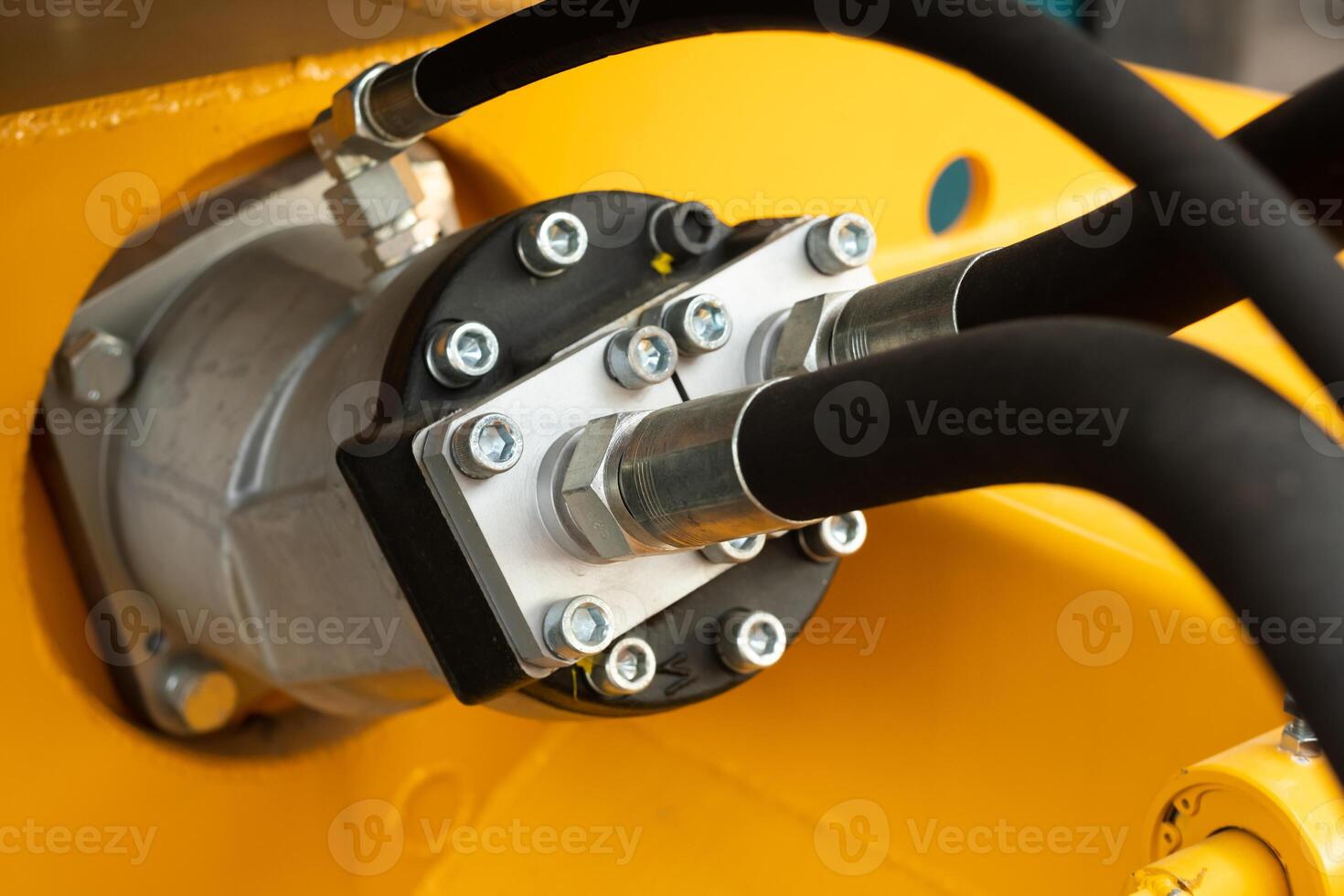 Close-up of an assembly with hydraulic pipes and couplings on a truck photo