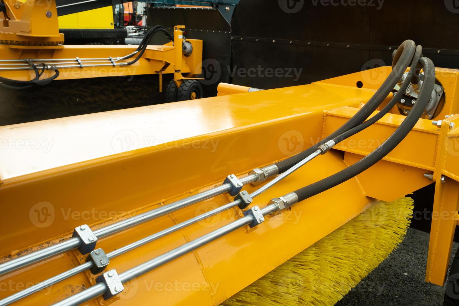 Close-up of an assembly with hydraulic pipes and couplings on a truck photo