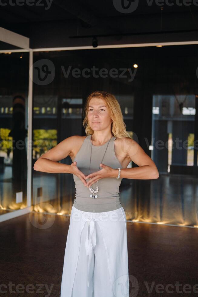The girl does yoga and is in a state of meditation. The concept of a healthy lifestyle photo