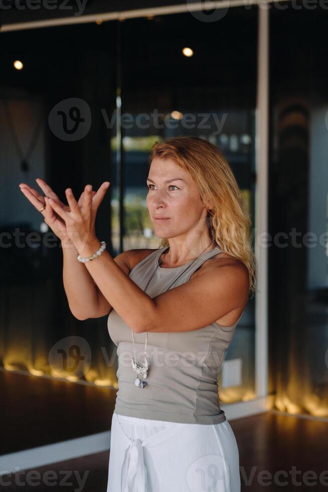 The girl does yoga and is in a state of meditation. The concept of a healthy lifestyle photo