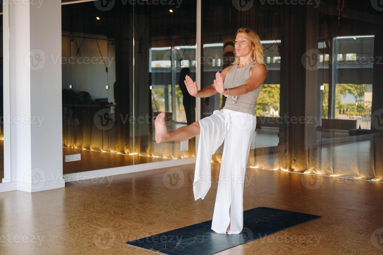 The girl does yoga and is in a state of meditation. The concept of a healthy lifestyle photo