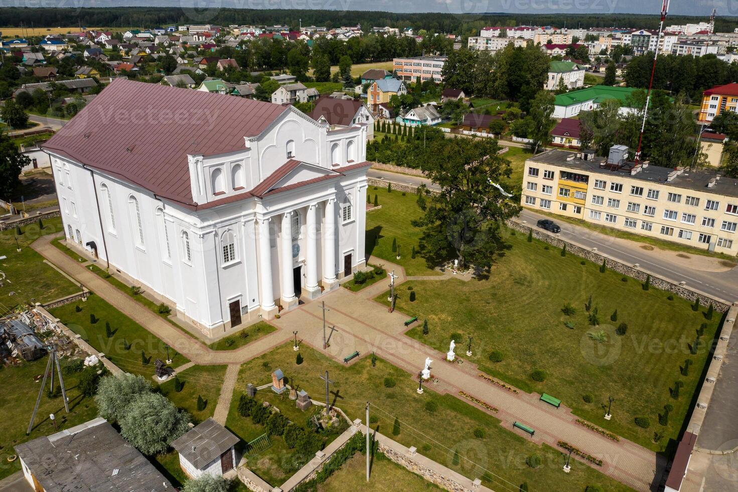 Top view of the white Church in the city of Ostrovets in the summer of the Grodno region, various panoramas of the city.Belarus photo