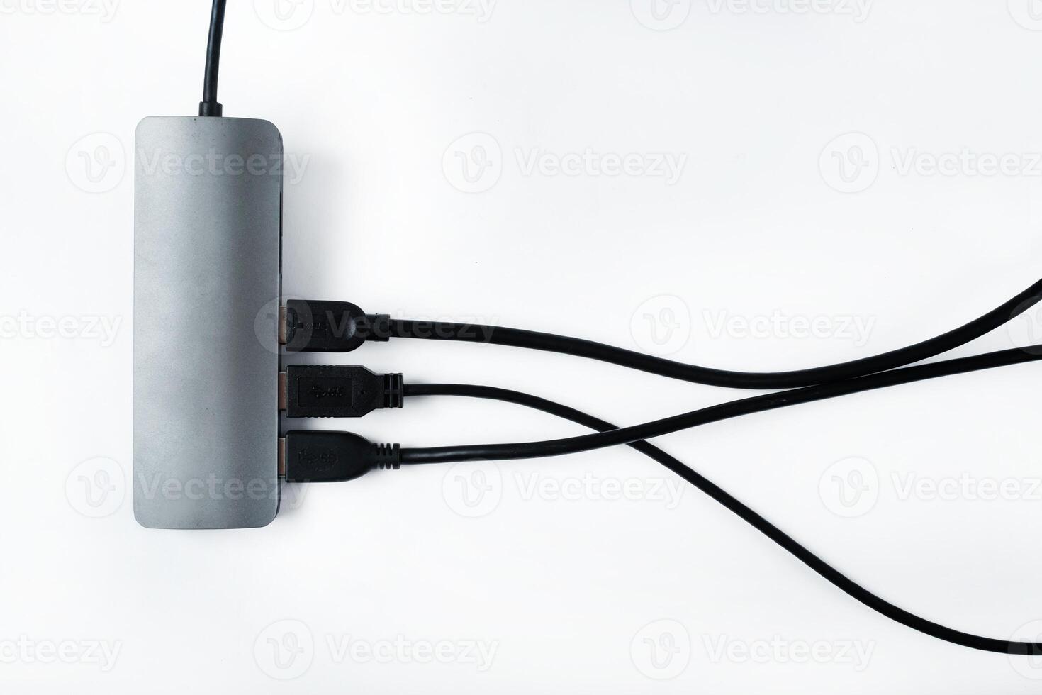 Adapter with external hard drives on a white background.Many different connections via the USB connector photo
