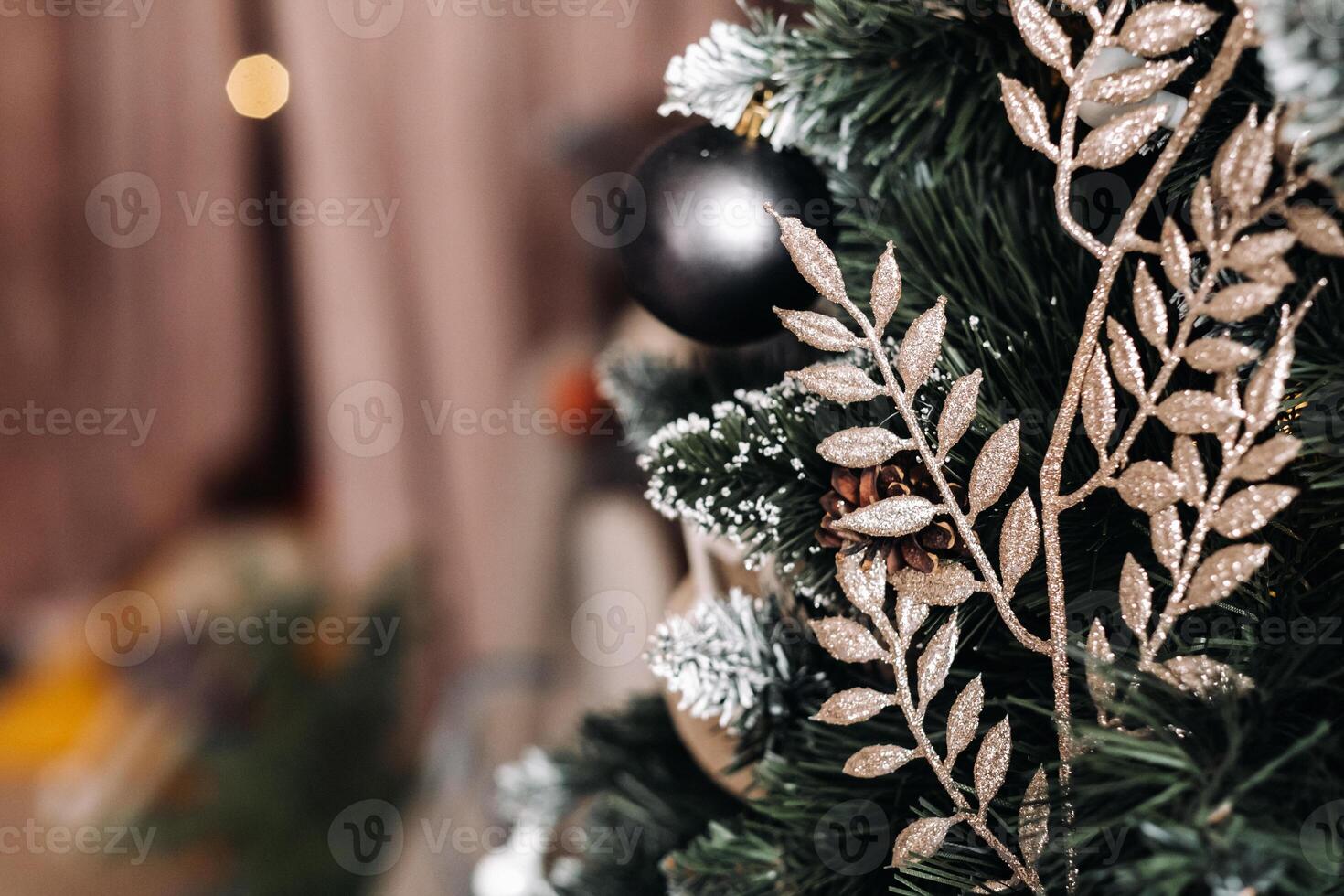 Christmas tree close-up. On New year's eve, a decorated snow-covered Christmas tree. photo