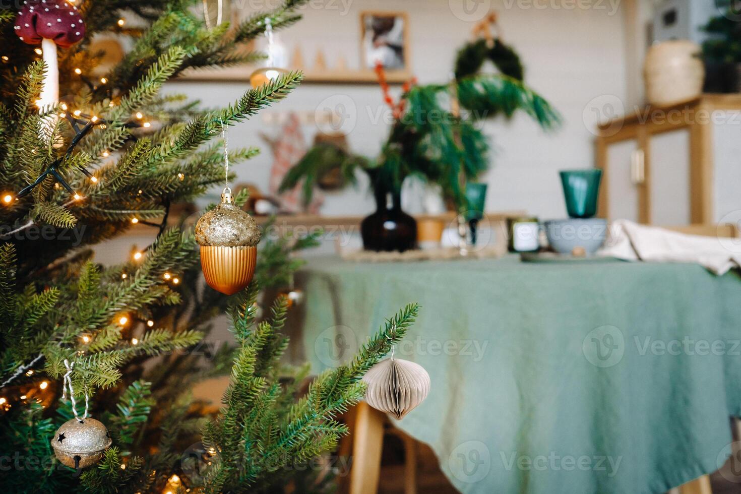 Close-up of a decorated Christmas tree with decorations in the interior of the Christmas kitchen photo