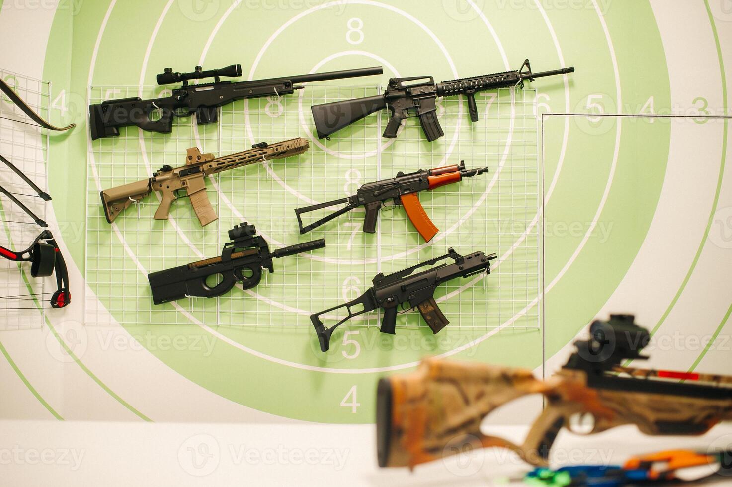A lot of different weapons for shooting in the dash.Air guns for shooting training. photo