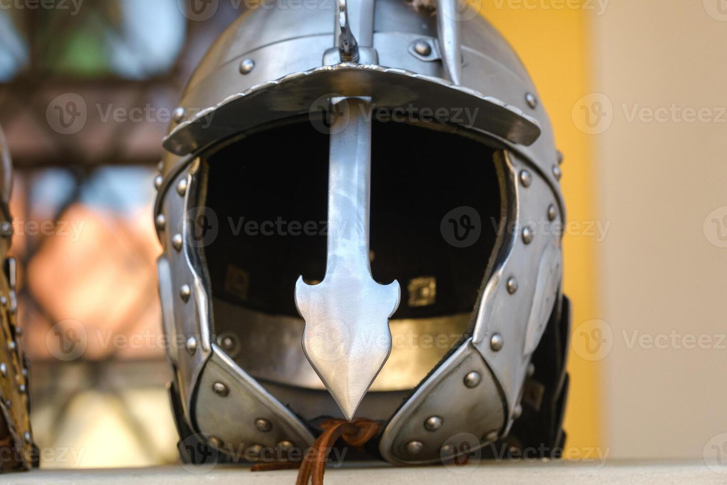 An ancient Knight's helmet with armor.A medieval concept photo