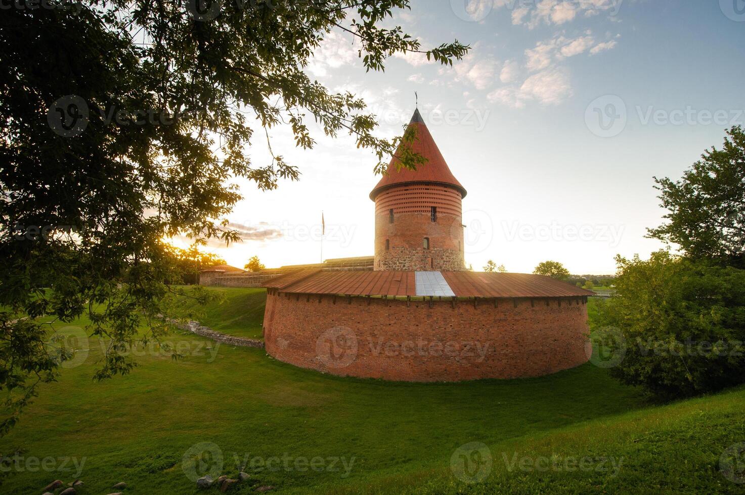 Kaunas castle in the Gothic style in summer at sunset, Lithuania photo