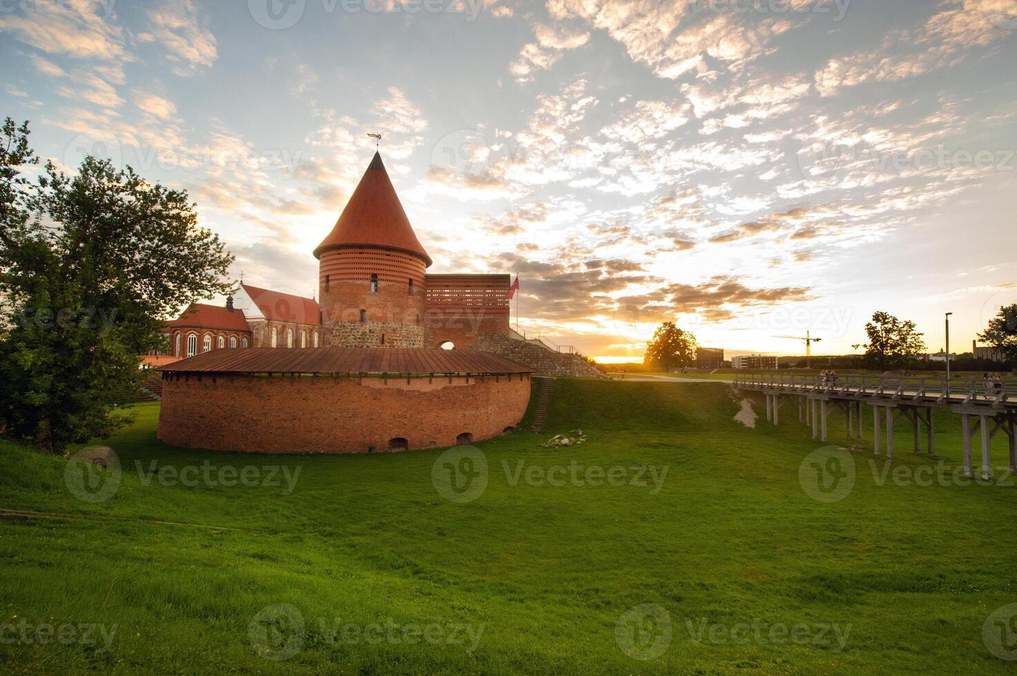 Kaunas castle in the Gothic style in summer at sunset, Lithuania photo