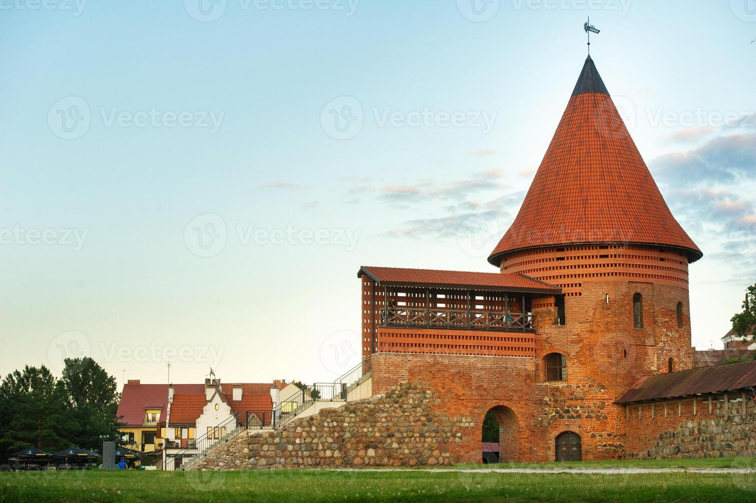 Kaunas castle in the Gothic style in summer at sunset, Lithuania photo