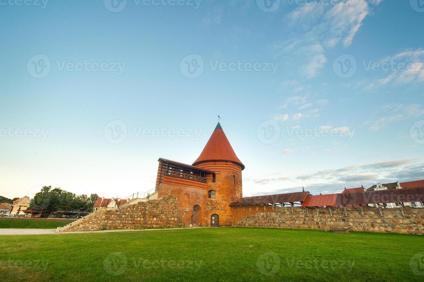 Kaunas castle in the Gothic style in summer at sunset, Lithuania photo