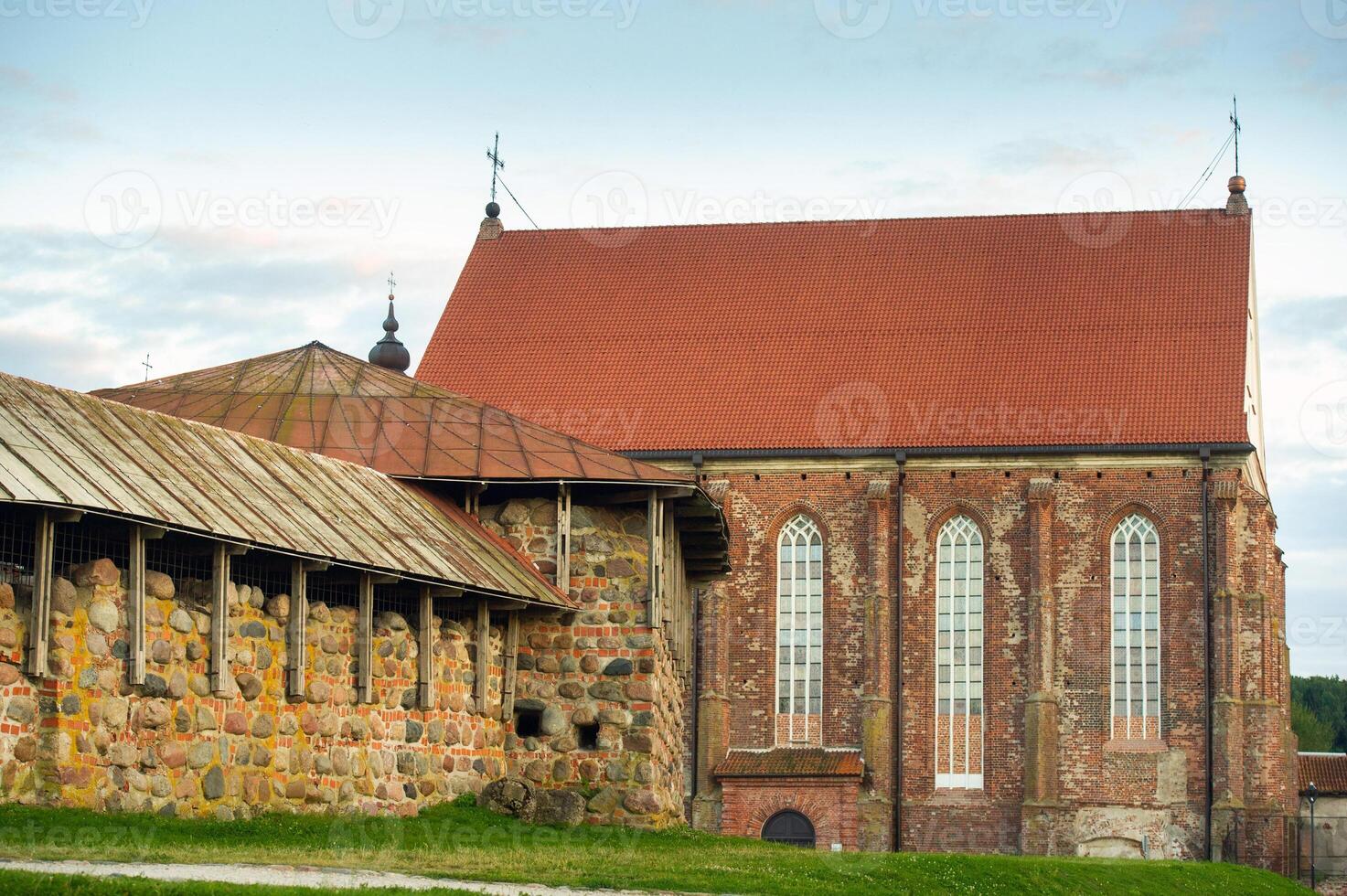 Kaunas castle in the Gothic style in summer at sunset, Lithuania photo